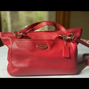 Beautiful red leather Coach handbag.